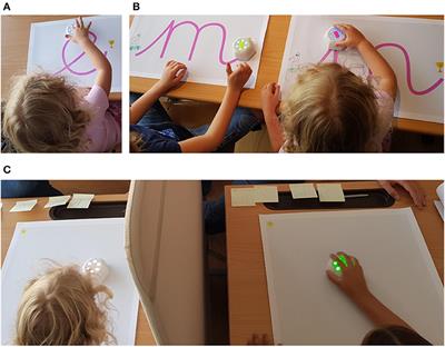 Iterative Design and Evaluation of a Tangible Robot-Assisted Handwriting Activity for Special Education